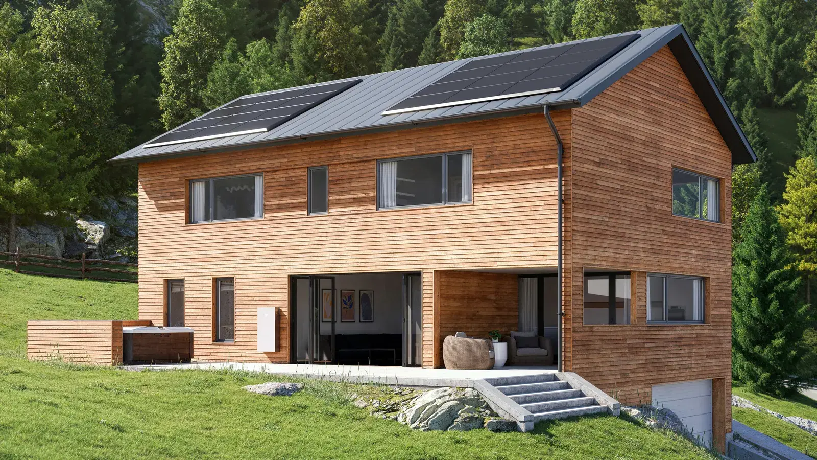 Wood-paneled two-story home set against a forested hillside, black solar panels on the pitched roof and a small white battery on the lower wall.