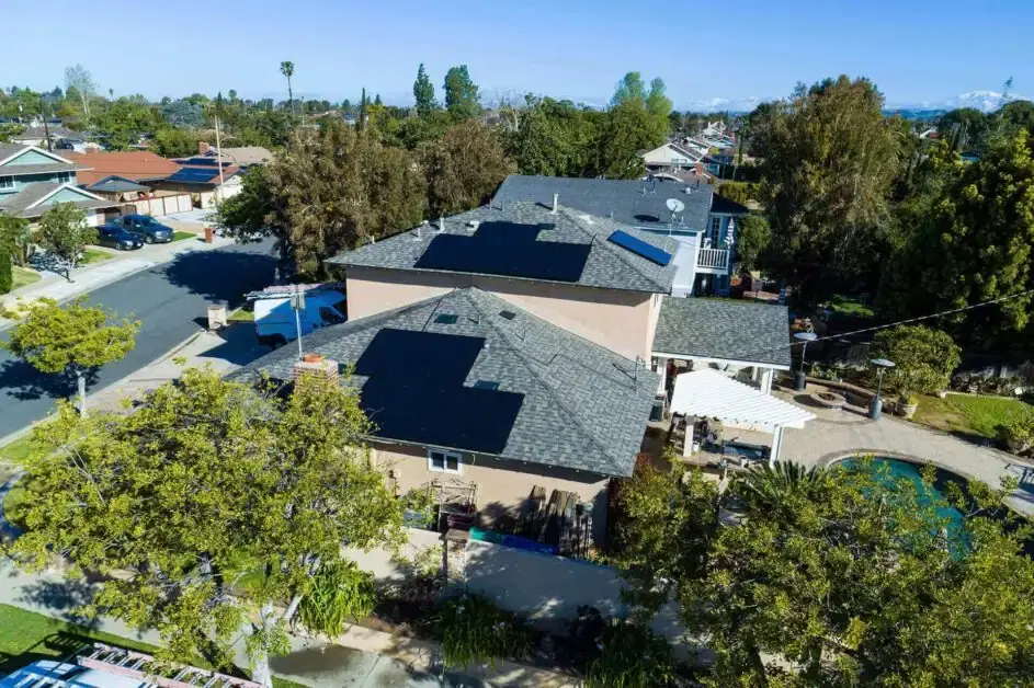 Solar panels on a home against a clear California sky