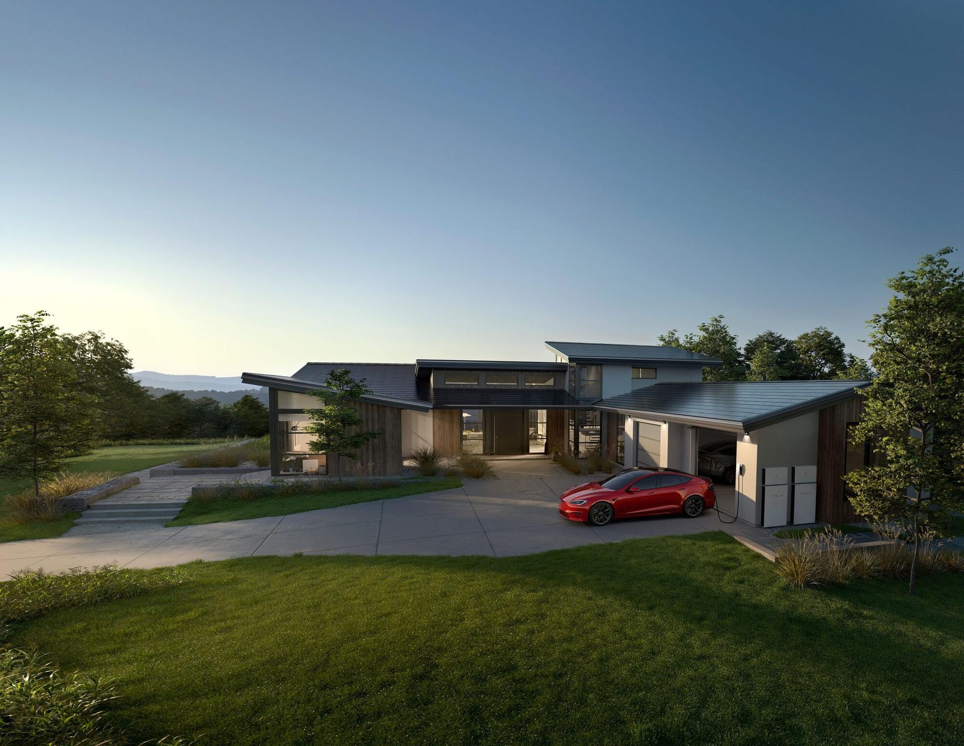 A premium home with a seamless Tesla Solar Roof viewed from the street