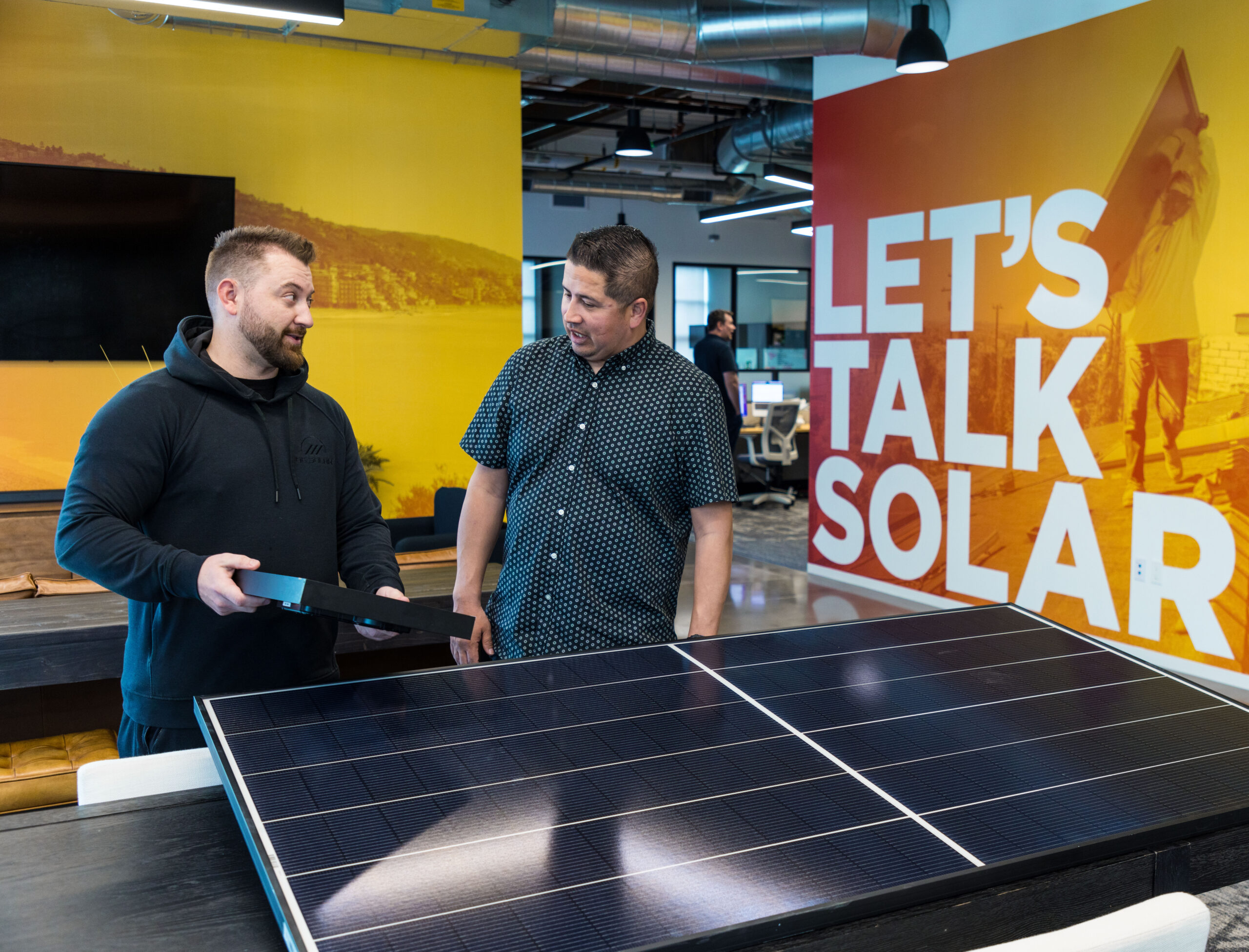 vinnie holding solar panel v2 pricing page