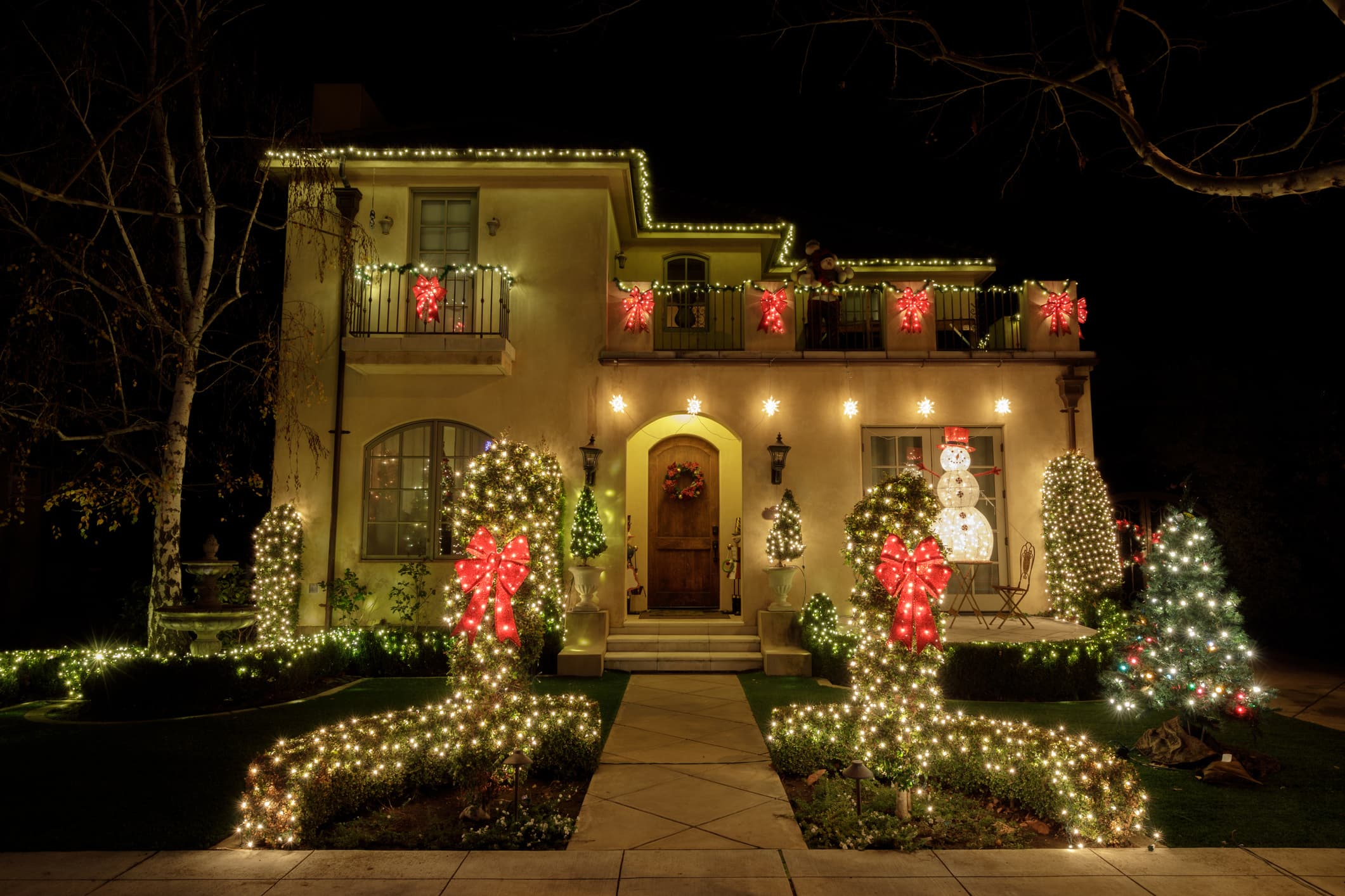Home in warm climate with holiday decorations and lights